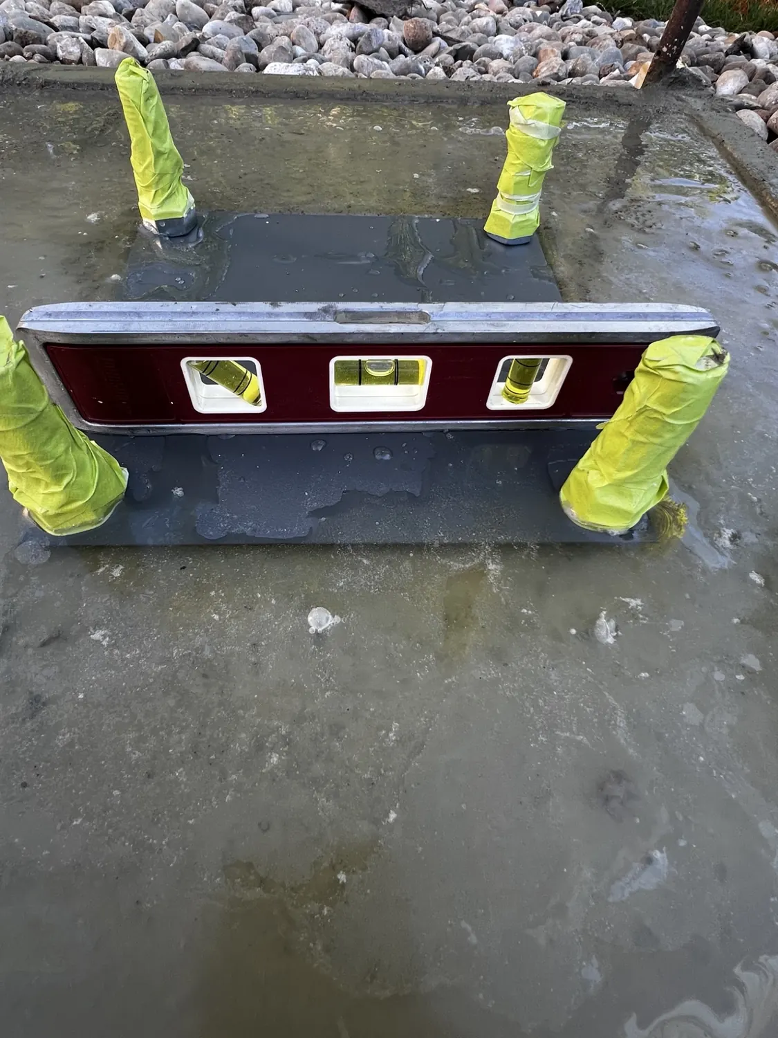 Anchor bolts checked level in fresh concrete