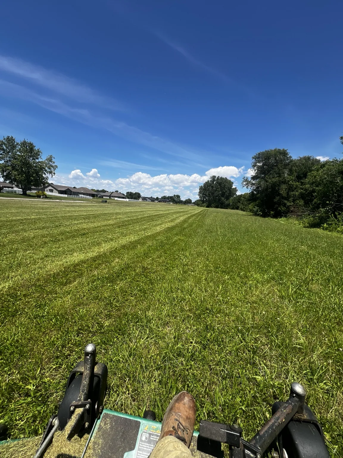 Mowing a broad commercial grass area