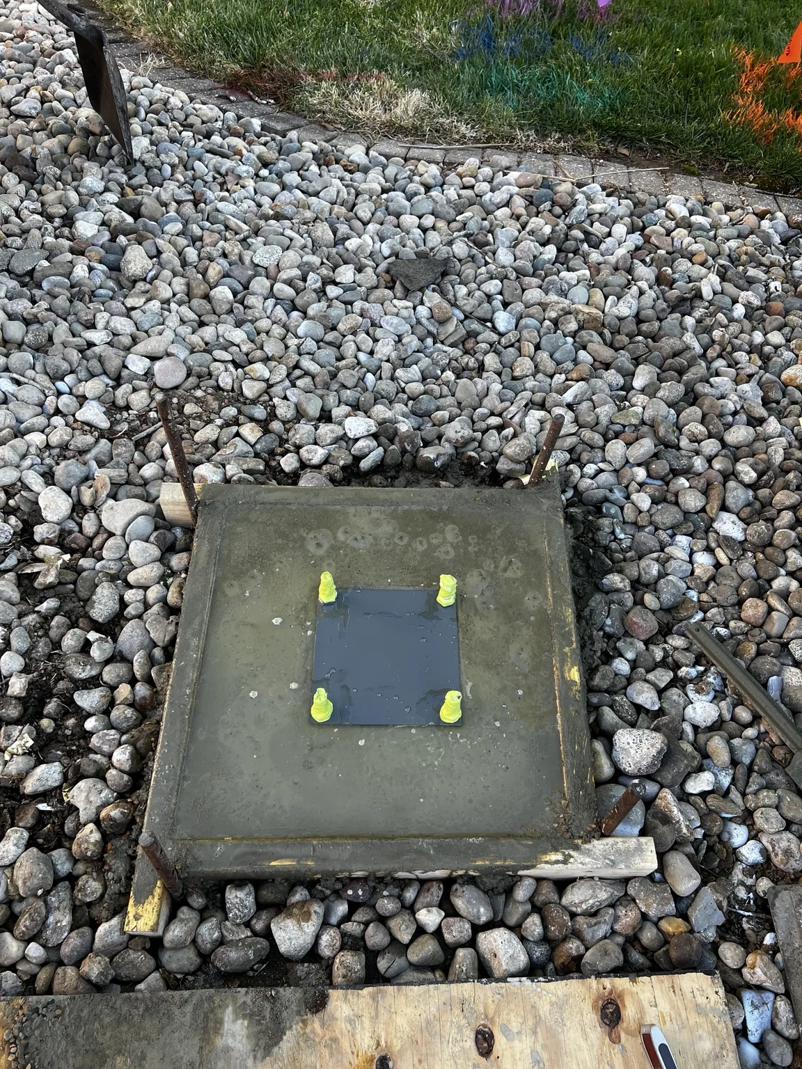 Anchor bolts positioned in the concrete footing