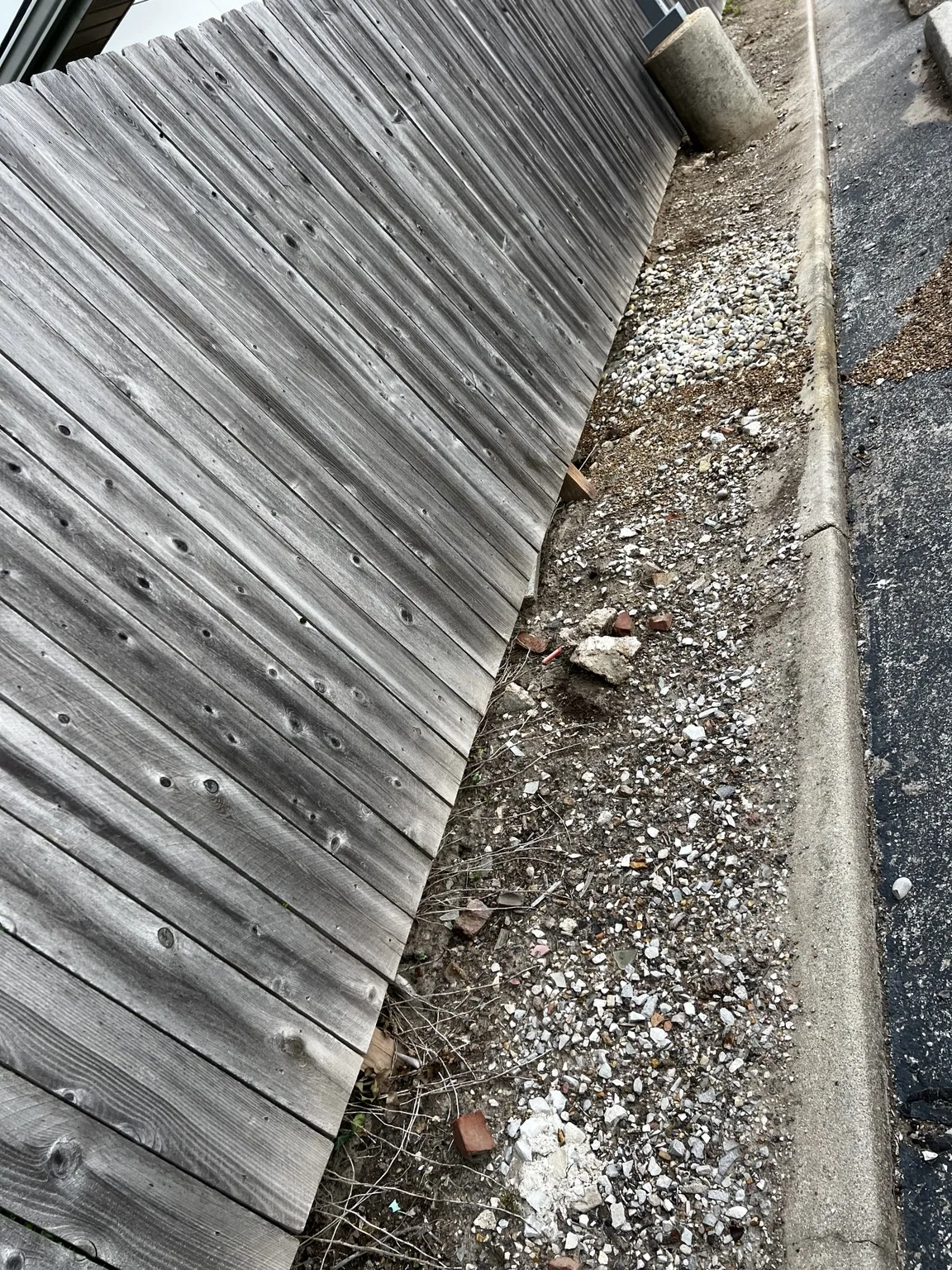 Concrete and rock debris in the strip before renovation